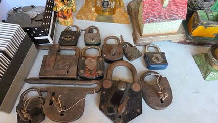 Vintage padlocks and antiques display at Zaragoza, Spain flea market