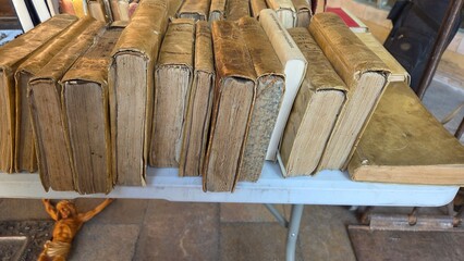 Antique book collection at Zaragoza flea market for vintage enthusiasts and collectors. Spain