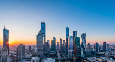 Obraz premium Modern city skyline with skyscrapers under clear blue sky. Urban architecture, business district, cityscape.