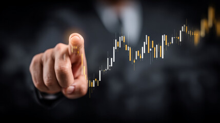 A professional's finger touches a dynamic digital stock chart, illustrating strategic financial growth and investment.
