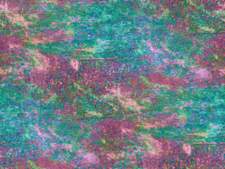 The image features a vibrant, abstract pattern with a mix of green and pink hues, creating a...