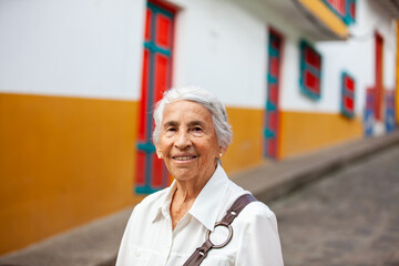 Senior woman at the beautiful colonial town of Concepcion located in the department of Antioquia in...