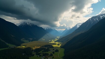 Fototapeta premium Alpine Valley with Dramatic Cloudscape.