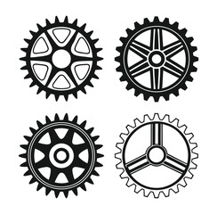 Set of four different gear wheels in black and white representing machinery engineering industry or technology isolated on a white background for easy use in