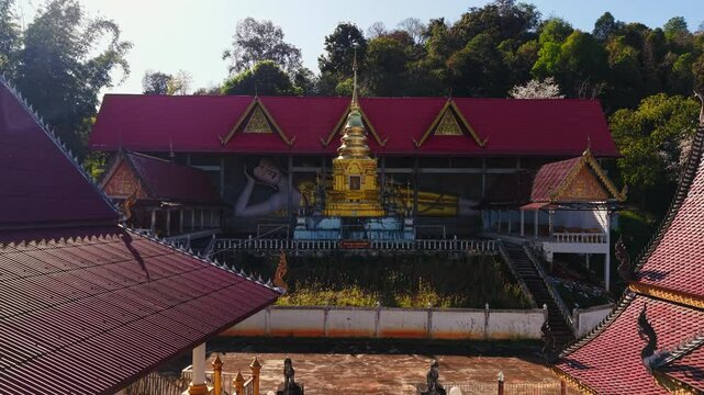 Wat pong yaeng nok buddhist temple in thailand, showcasing its architecture and surrounding landscape