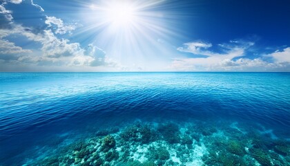 tranquil sea water surface on a sunny day underwater sea in sunlight tropical blue ocean underwater background