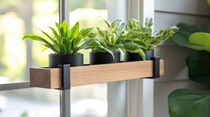 Wooden window planter box with potted plants