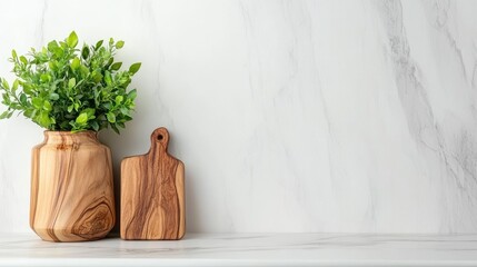 Wooden vase and cutting board on marble background