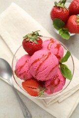 Tasty sorbet with strawberries and mint served on light table, flat lay