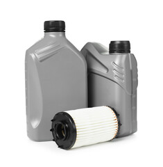 Motor oil in plastic canisters and filter isolated on white