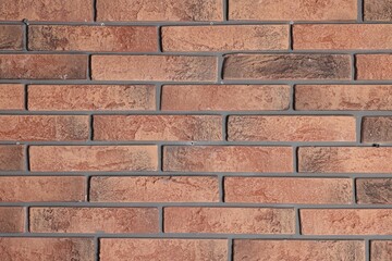 Texture of red brick wall as background, closeup