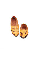 A pair of light brown casual leather shoes isolated on white background, perfect for leather industry catalog design