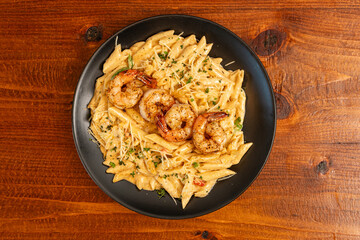 Penne pasta with grilled shrimp
