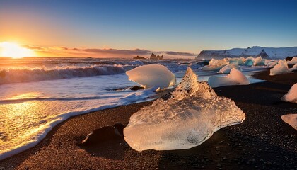 stunning ice formations glisten on a black sand beach at sunrise in iceland