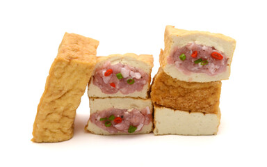 Tofu block and cut cubes, isolated on white background.