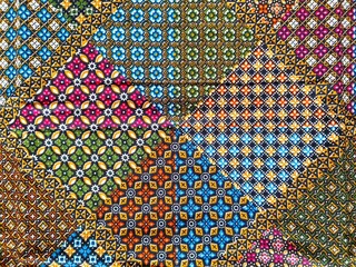 Sarong multicolor woven handmade Thai traditional fashion fabric textile original pattern style backgrounds and textures design.	