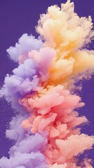 Fototapeta premium Colorful smoke explosion in shades of purple, pink, and orange against a deep violet background, creating a vibrant and dynamic visual effect for artistic and creative projects