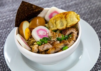 Delicious Ramen Bowl with Toppings Noodles Egg Pork and More. Lámen