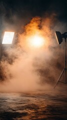 Bright Studio Lights Illuminating Dramatic Orange Smoke in Dark Professional Photography Studio