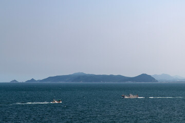 Obraz premium idyllic seascape with fishing boats