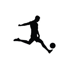 Silhouette of Soccer Player Kicking Ball