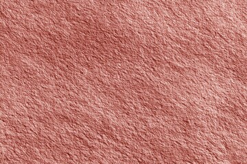 Textured pink paper background with subtle creases and soft tone