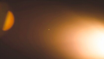 soft vintage light leak in warm tones like orange and amber, perfect for retro cinematic overlays with blurred edges and glowing lens flares.
