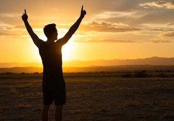 Fototapeta premium Silhouette of a man celebrating sunset in a desert landscape. Generative Ai