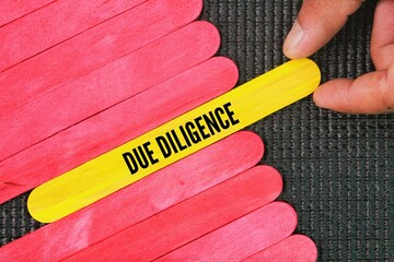 Colored stick with the word due diligence. the concept of self-integrity. the concept of...