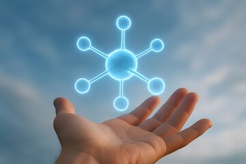 Human hand holding a glowing blue molecular structure against a cloudy sky