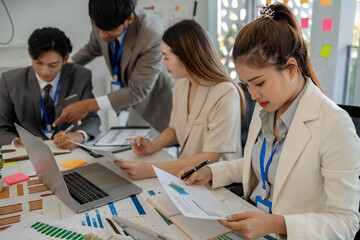 Fototapeta premium the atmosphere of the company's employees' meeting, businessmen brainstorming to increase the company's income, entrepreneur, marketing, finance, accounting, discussion, startup