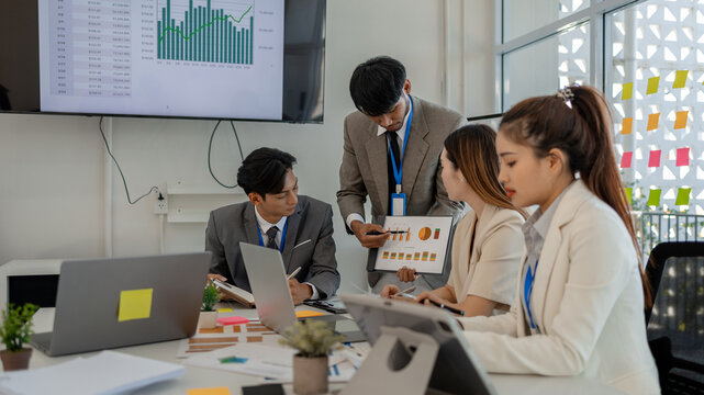 entrepreneurs discuss together to brainstorm and solve problems in various departments of the company, marketing, finance, and accounting are having a meeting in a conference room