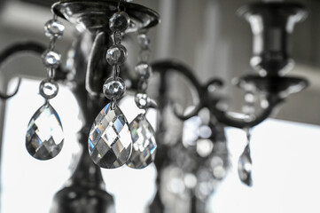 sparkling crystal chandelier, elegant glass drops, luxurious lighting detail