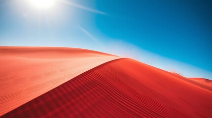 Naklejka premium Red dune landscape under clear blue sky