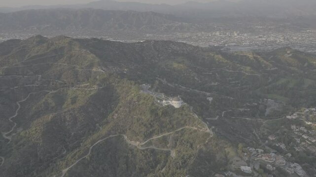 Aerial view of Griffith Observatory above Griffith Park with Glendale in the background. SLog3