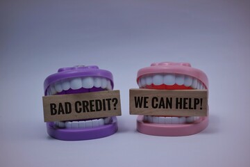 A mouth toy that bites a wooden block with the words 