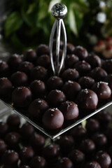 chocolate truffles,truffles,chocolate ball on a wooden tray, condensed milk candy balls, chocolate...