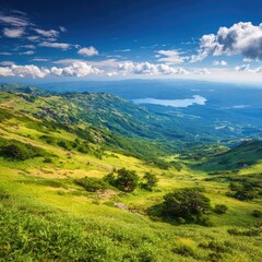 Obraz premium Mountain vista, lush green slopes, clear sky