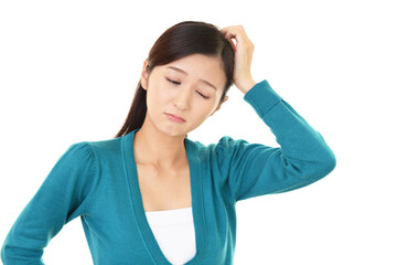 体調不良の女性