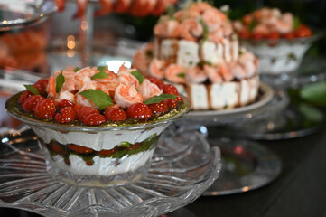 shrimp caprese, shrimp caprese salad with cherry tomatoes and mozzarella, gourmet seafood caprese served in glass bowl, elegant shrimp appetizer with basil

