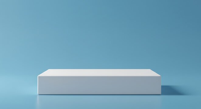 Minimalist composition of a white rectangular platform against a light blue background, creating a clean and modern aesthetic.