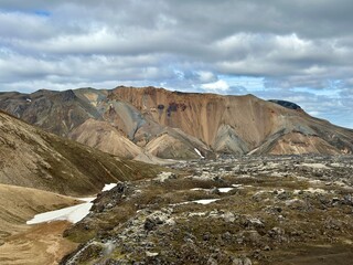 Hiking in Landmannalaugar, Iceland with snow capped mountains