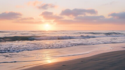 Obraz premium Soft pastel sunset painting the sky over a calm ocean beach, with gentle waves lapping the shore. The sky blends hues of pink, blue, and purple, while the water mirrors the serene colors, 