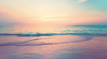Fototapeta premium Soft pastel sunset painting the sky over a calm ocean beach, with gentle waves lapping the shore. The sky blends hues of pink, blue, and purple, while the water mirrors the serene colors, 