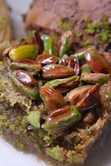 Delicious turkish baklava featuring pistachios and sweet layers