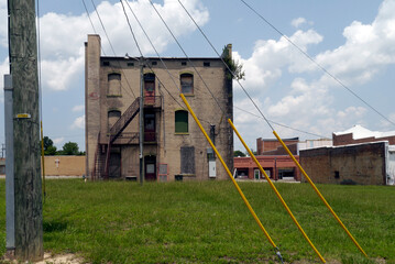 Unkempt Backyard of an Abandoned Industrial Building, Hamlet NC 2025
