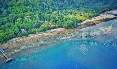 Aerial view of the stunning coastline of Saproken Scuba Republik Waisai. Showcasing a confluence of...
