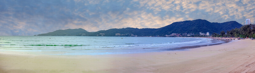 Beautiful and colourful Panorama of Patong Beach at Sunset on the romantic island of Phuket Thailand 