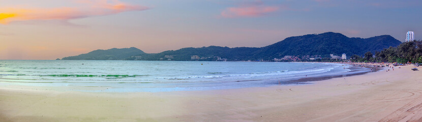 Beautiful and colourful Panorama of Patong Beach at Sunset on the romantic island of Phuket Thailand 