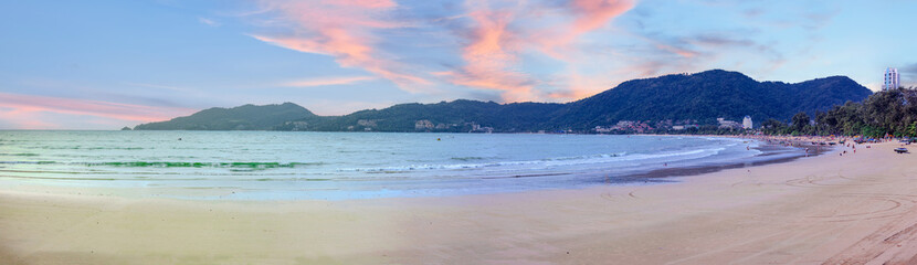 Beautiful and colourful Panorama of Patong Beach at Sunset on the romantic island of Phuket Thailand 